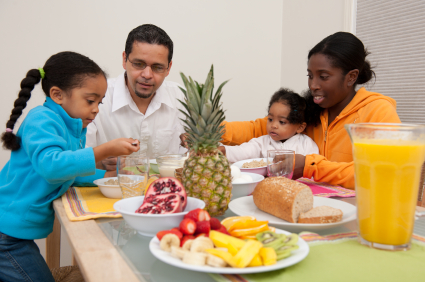 Family dinner, eating pineapple